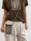 Remera diseño flor con cartera