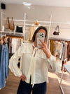 Camisa volados y lazo
