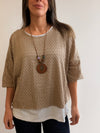 Buzo superpuesto calado con collar