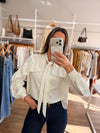 Camisa volados y lazo