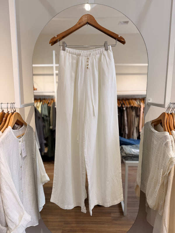 Pantalón con botones y lazo