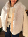 Campera puffer pelo y capucha