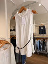 Blusa cuello trenzado con cinto y volado