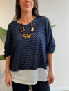 Buzo superpuesto calado con collar