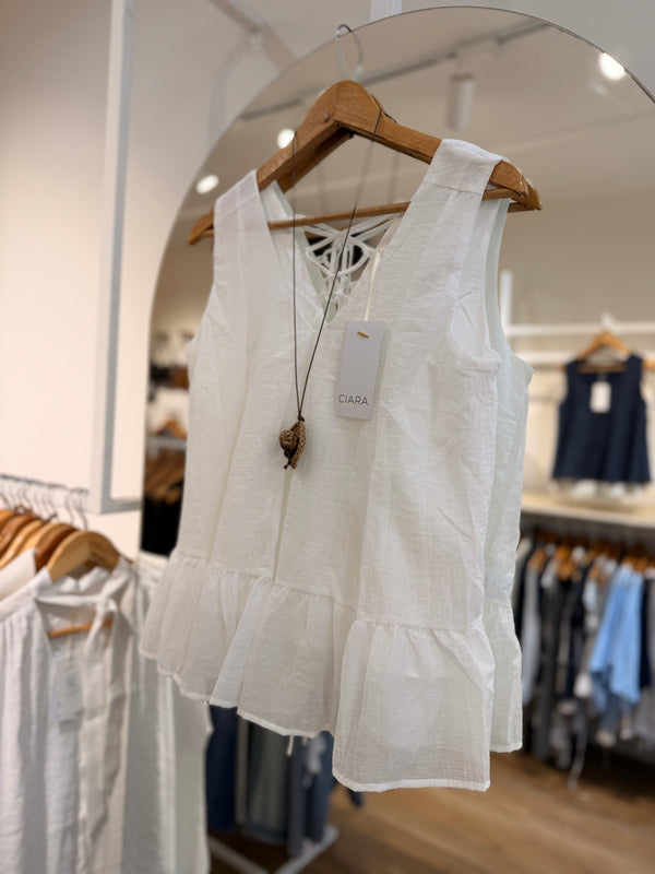 Blusa peplum con collar
