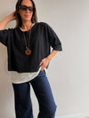 Buzo superpuesto con collar