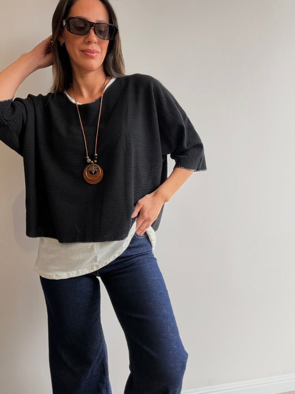 Buzo superpuesto con collar