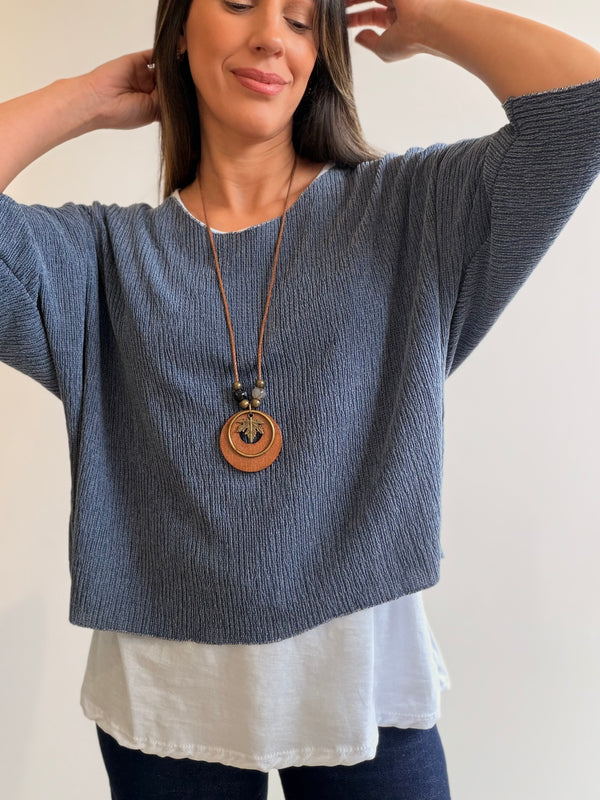 Buzo superpuesto con collar