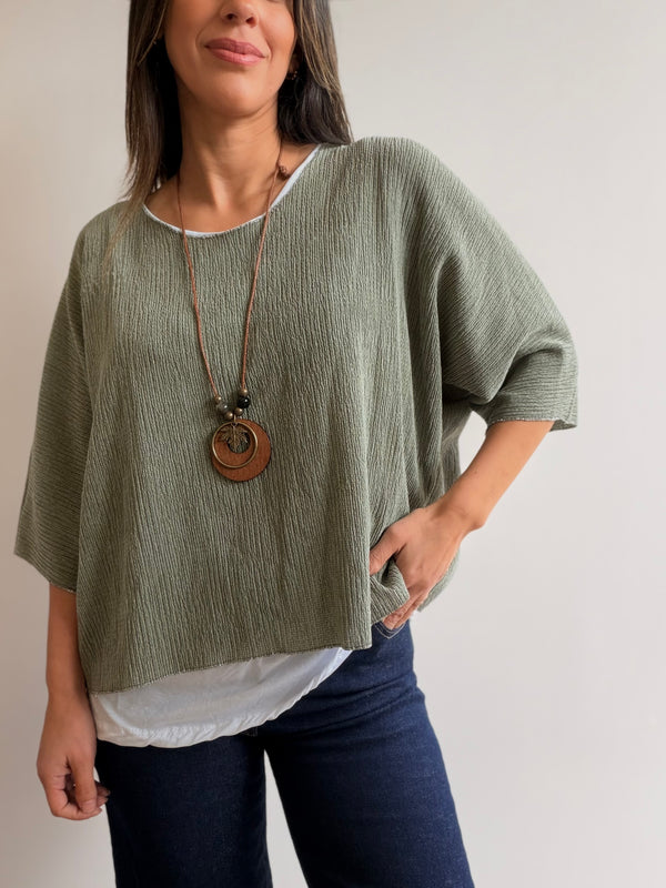 Buzo superpuesto con collar