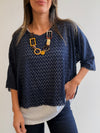 Buzo superpuesto calado con collar