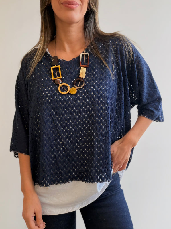 Buzo superpuesto calado con collar