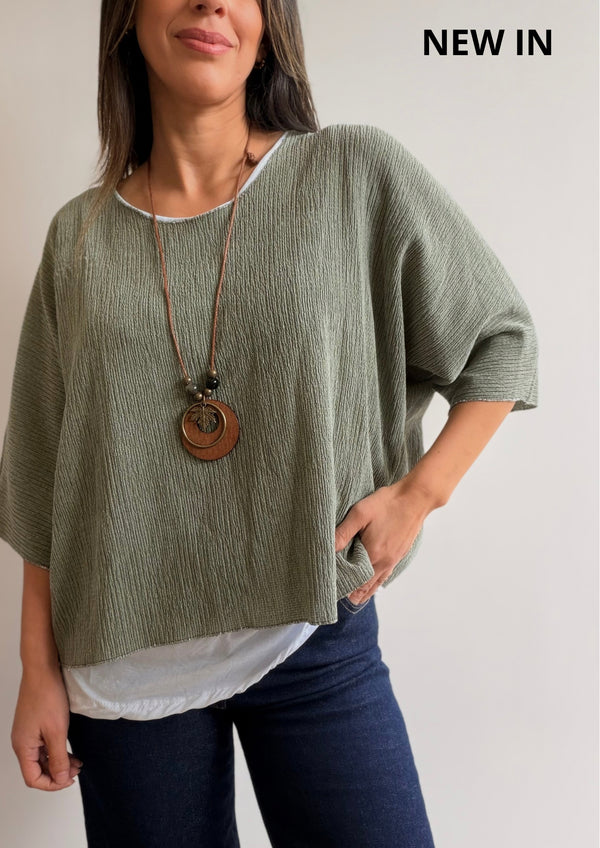 Buzo superpuesto con collar
