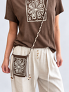 Remera diseño flor con cartera