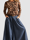 Pantalón palazzo Denim con cinto