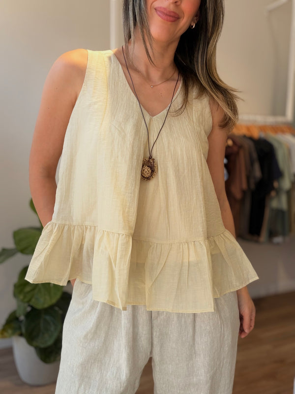 Blusa peplum con collar