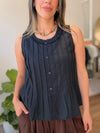 Blusa de tablitas con cuello volado
